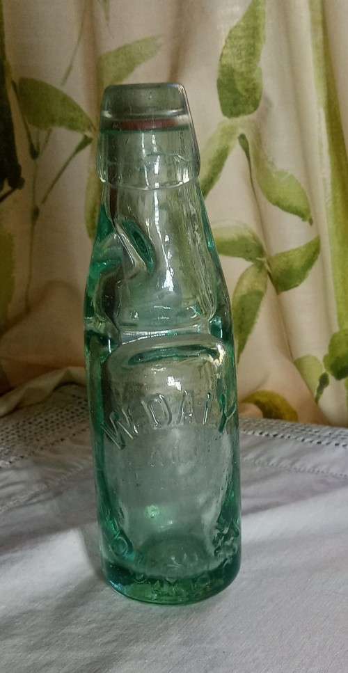 Bottles Antique W. Daly, Durban glass bottle with marble stopper was