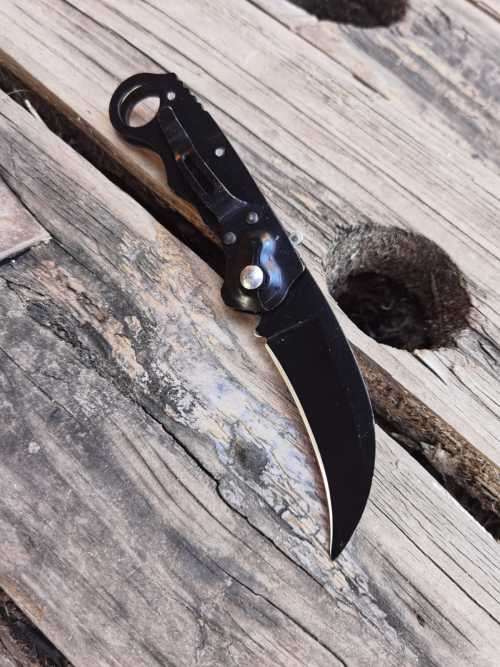 Knives & Daggers Black Push Button Karambit was sold for R1.00 on 6 Apr at 2346 by Fame Inc