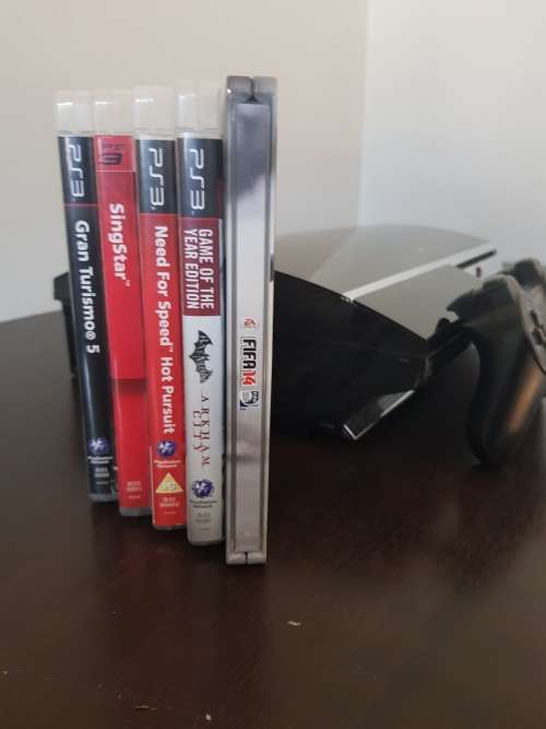 Consoles Playstation 3 + games was sold for R1,300.00 on 30 Jul at 00