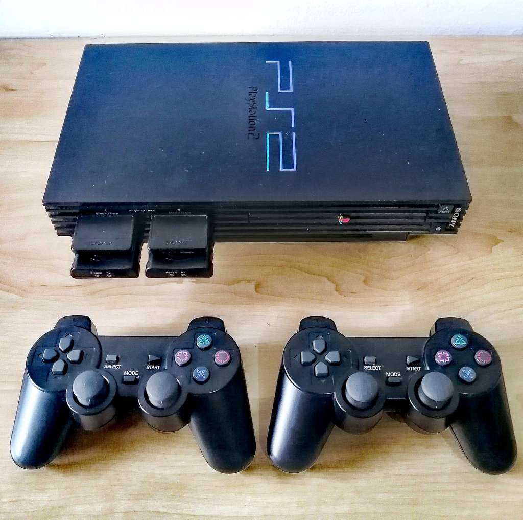 PlayStation Sony PlayStation 2 Phat + Two Wireless Controllers for