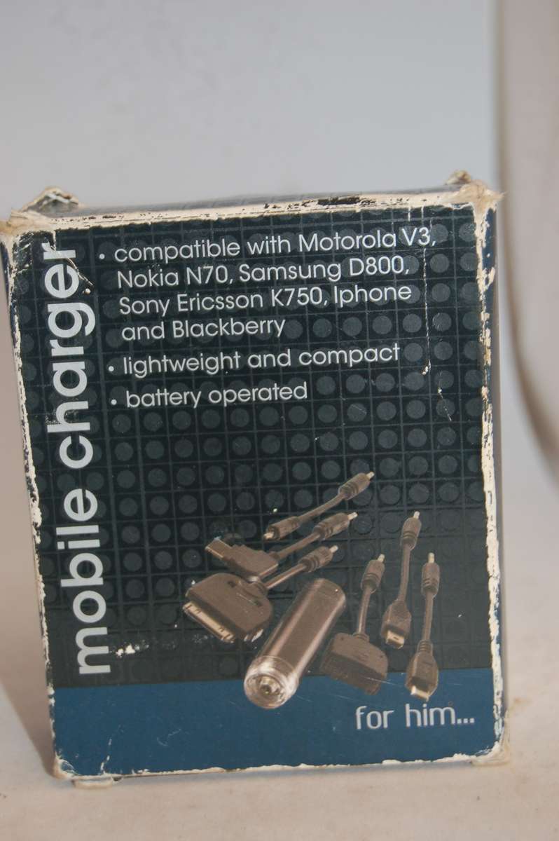 Battery Chargers POCKET SIZED OLDER CELL PHONE CHARGER WITH VARIETY OF CONNECTIONS was sold