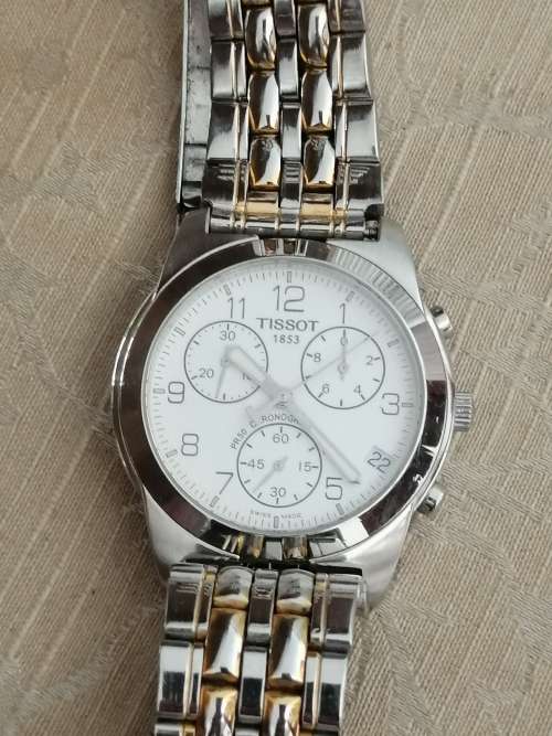 A TISSOT 1853 PR50 CHRONOGRAPH STAINLESS STEEL SILVER AND GOLD TONE MENS WATCH