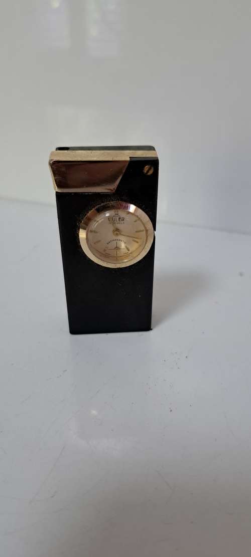Smoking Accessories LIGHTER WITH CLOCK was sold for R30.00 on 2 Jul