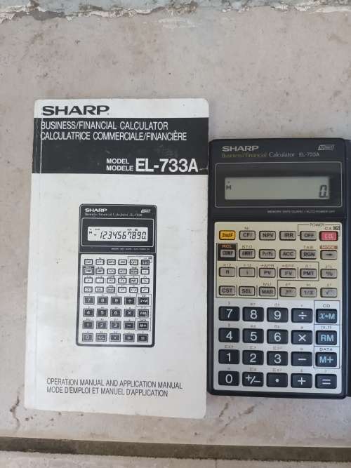 Calculators SHARP EL733A Business/ Financial Calculator was sold for