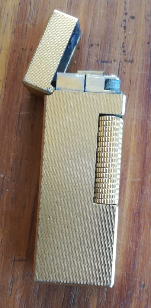 Smoking Accessories - Vintage Dunhill Switzerland Gold US RE24163 PATENTED Lighter. was sold for R513.00 on 19 May at 21:31 by cadewinnaar in Heidelberg