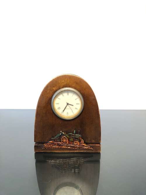 Alarm & Travel Clocks A JOHN DEERE SOUVENIR BEDSIDE CLOCK IN VINTAGE STYLE was sold for R65.01