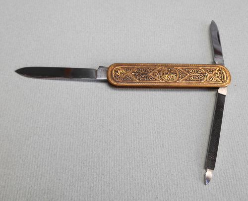 Vintage Bayer brass and enamel pocket knife by J. Bierhoff made in Solingen, Germany.