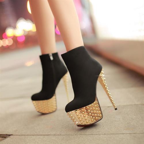 black bootie with gold heel