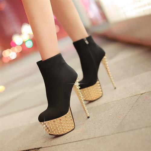 black boot with gold heel