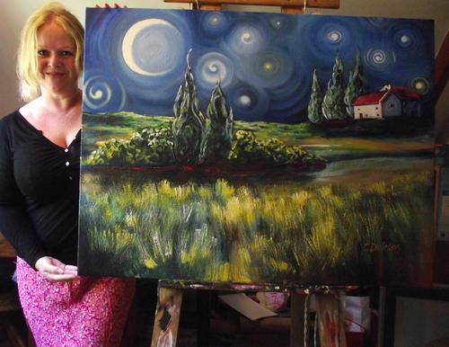 Cherie Roe Dirksen with her painting 'Cosmic Dance'