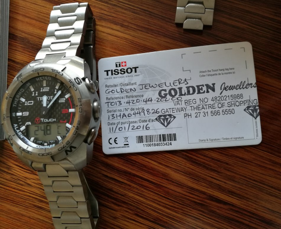 Как отличить оригинал тиссот. Tissot t013.420.46.201.00. Tissot t-Touch Expert Titanium. Tissot t690. Гарантийный талон тиссот.