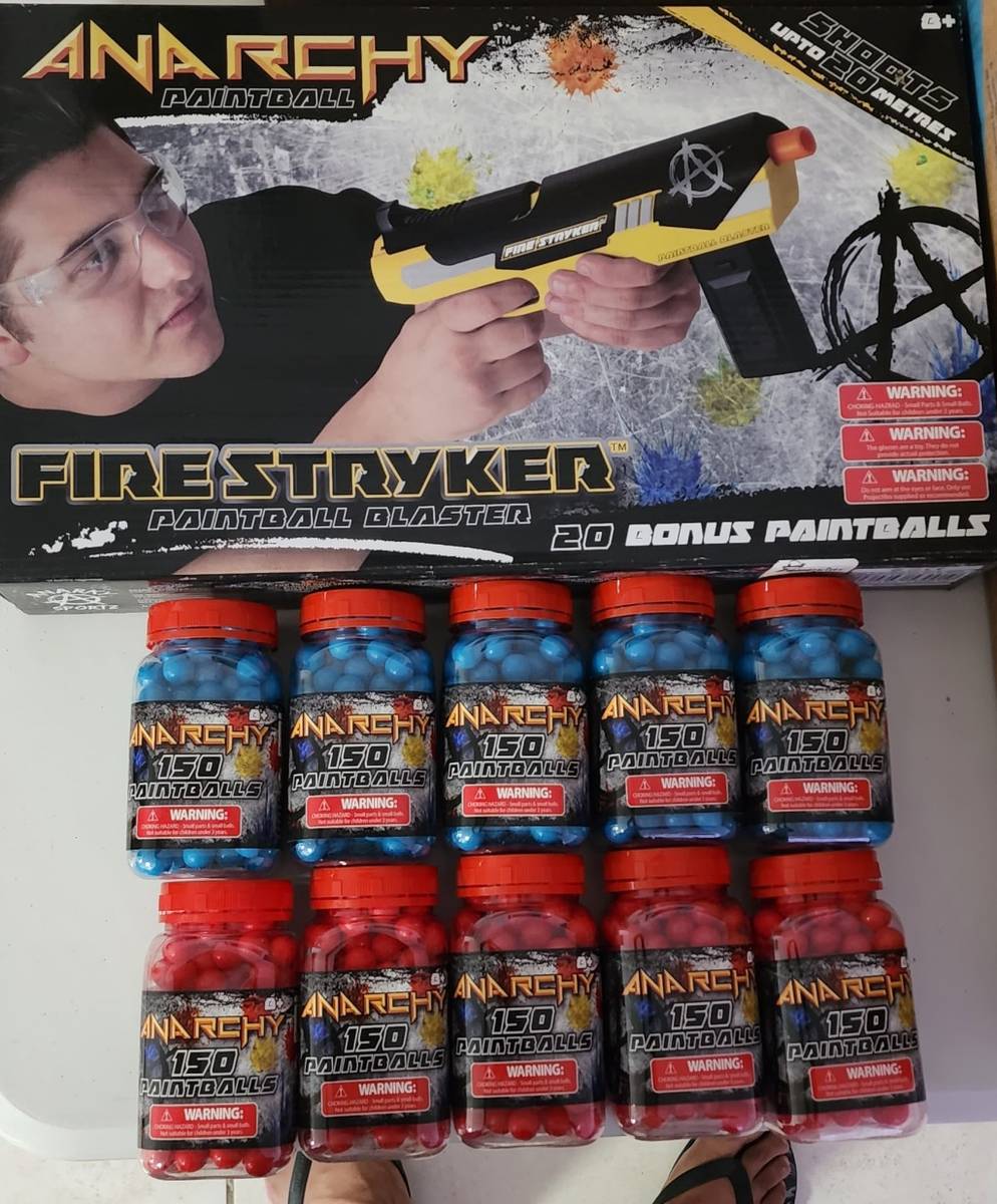Guns & Markers Anarchy Paintball gun and 10 bottles of paintball