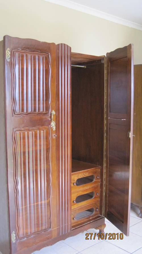 Cupboards His and Hers Imbuia Ball and Claw Wardrobes was listed for