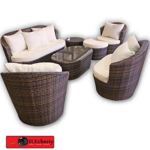 Brown Poly Rattan Outdoor Lounge Suite includes: - 1 x twin seater - 1 x triple seater - 2 x single seater with foot rests - 2 x coffee tables - canvas cushions