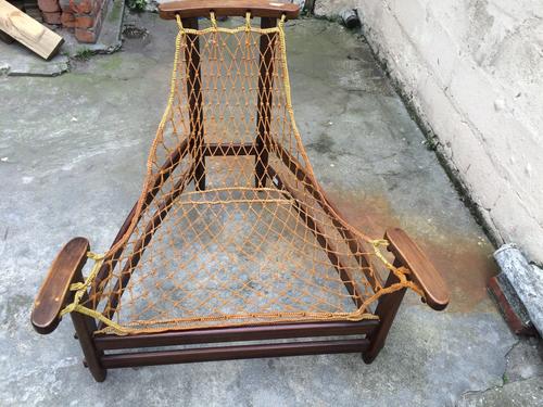 Jacaranda chair with leather removed cords and rosewood exposed