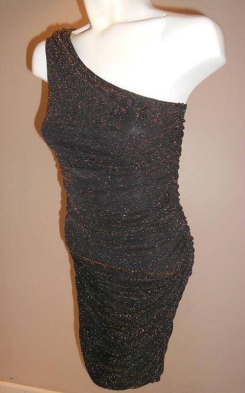 Formal Dresses Black & Gold Koukla YDE Dress was listed for R250.00