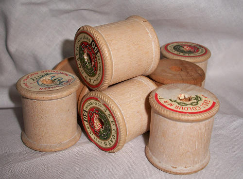 Vintage wooden cotton reels.