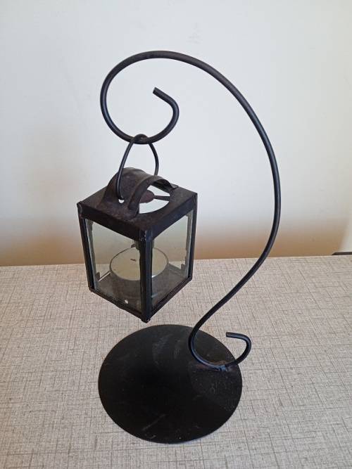 Candlesticks & Candle Snuffers Pretty candle holder was sold for R29