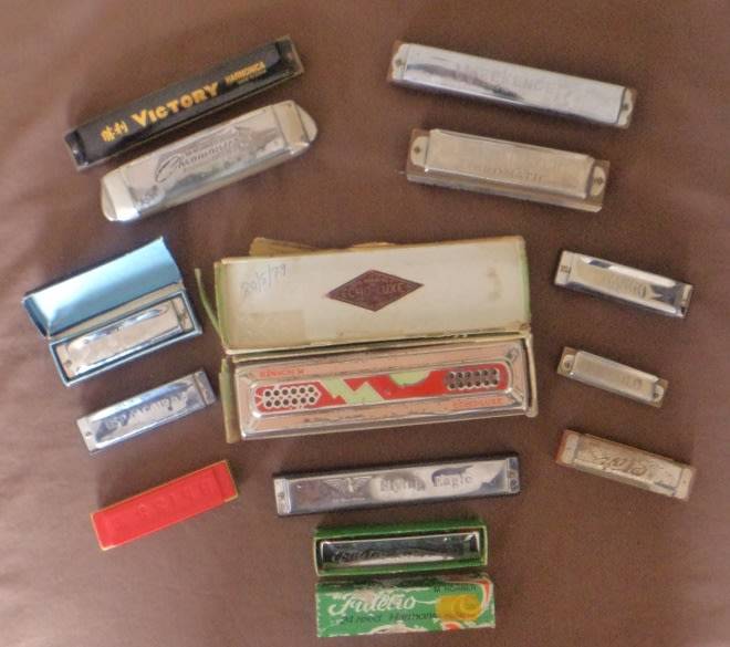 Woodwind & Harmonicas A lot of 13 Vintage Harmonicas was sold for