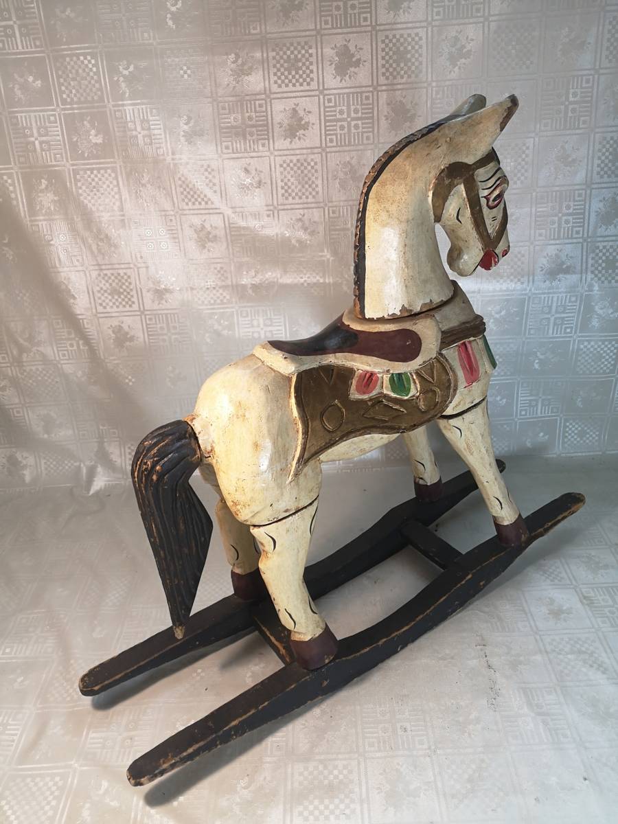 Wooden MAGNIFICENT VINTAGE HAND CARVED WOODEN ROCKING HORSE was sold for R525.00 on 17 Jan at