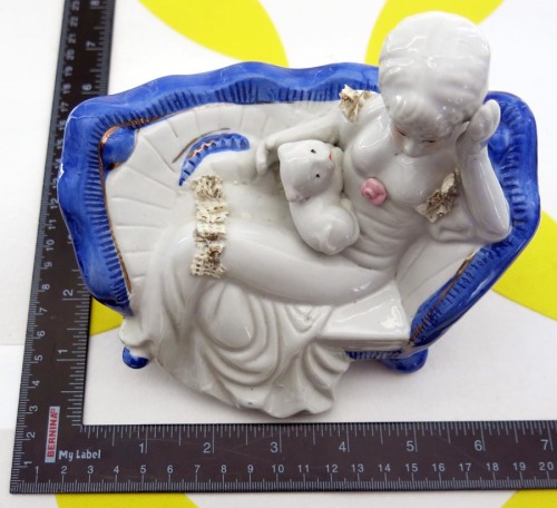 Rooi Brak Figurine reclining lady with cat ceramic porceline lace chais lounge