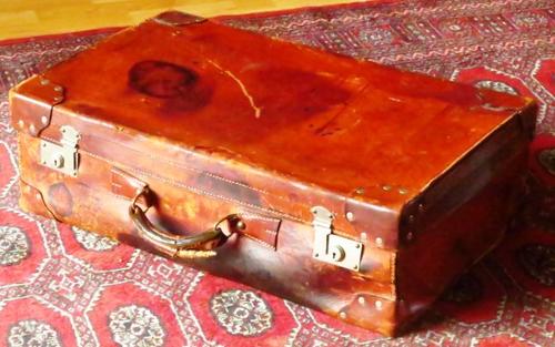 Antique leather well-traveled suitcase c1900