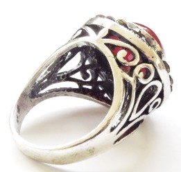 Antique silver tone fashion ring with smooth round red stone