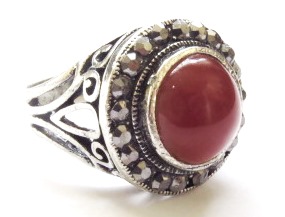 Antique silver tone fashion ring with smooth round red stone