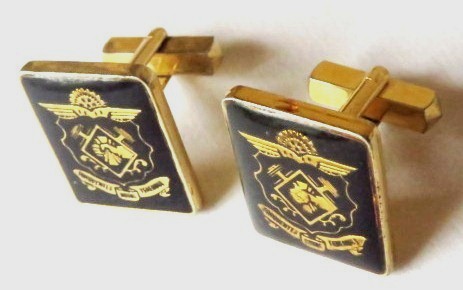Vintage gold tone and black cufflinks with coat of arms 