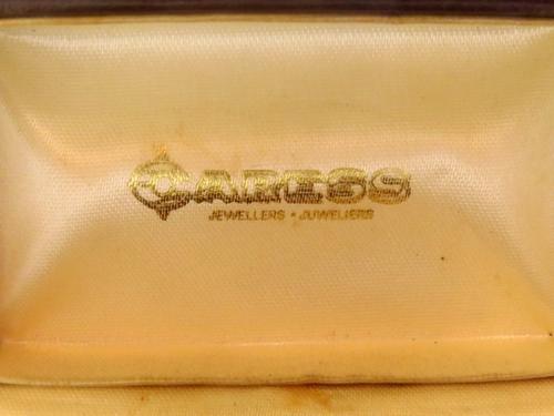 Vintage gold tone bulldozer tie pin in original Caress Jewellers box