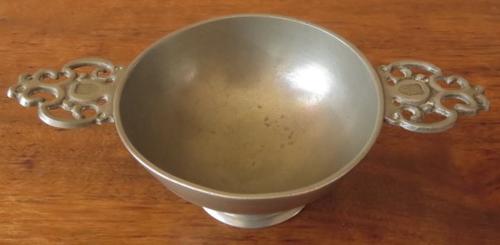 Vintage European pewter double handled porringer bowl on a raised foot