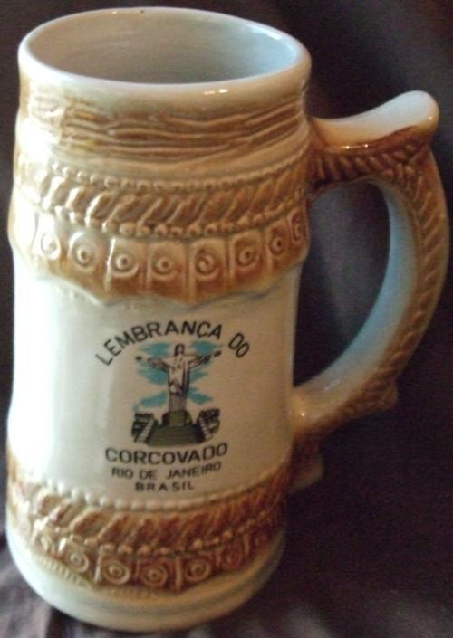 Ceramic Lembanca DO Corcovado Beer Mug  Rio De Janeiro Brasil stamp Canecas 893-2000 Pedreira-Sp Sao Joaquim Imprinted  55 L cup mug crafted design brown cream litre fifty five beer kitchen bar home collect collectable old antique beautiful nice wow gift present birthday christmas collection item collector display drinking drink low price cheap bargain special crazu wacky tuesday wednesday weekend auction bid buy now must have amazing europe international brazilian pottery overseas gift shop ingraving limited stock sale bargain going soon must have bid buy now handle coffee beer bar lounge kitchen 
