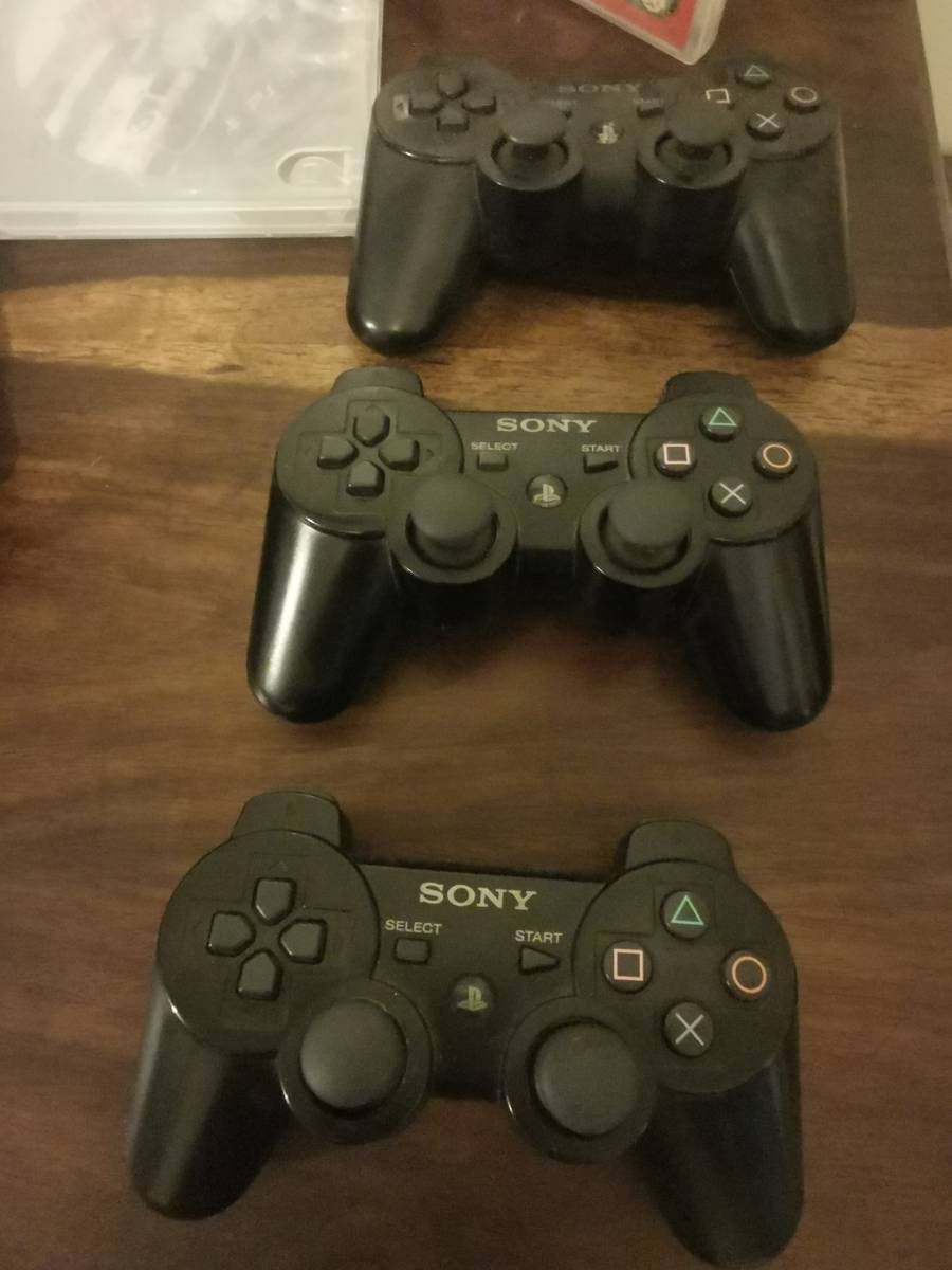 PlayStation Sony PlayStation 3 Console with 3 Remotes and a Few Games