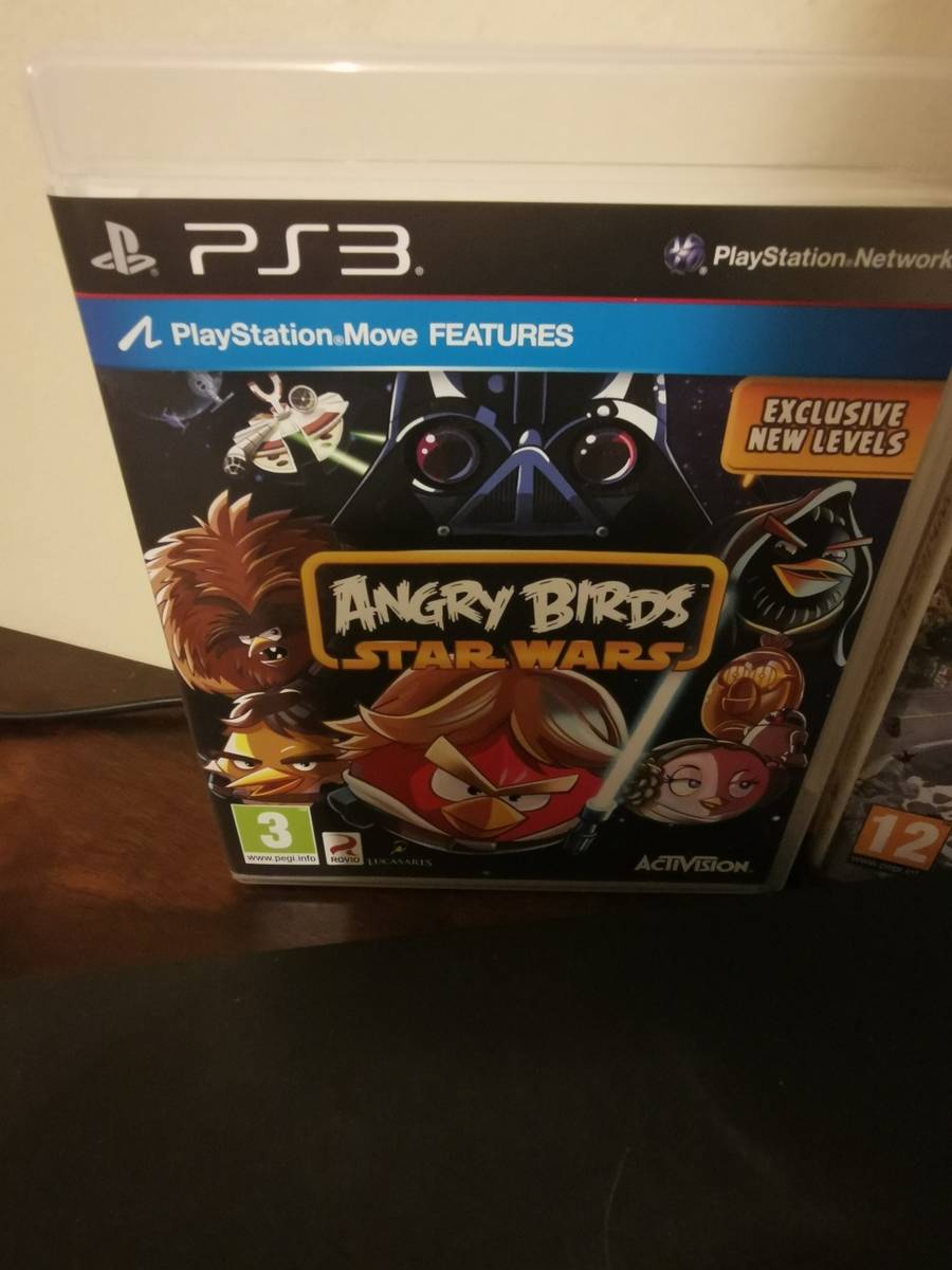 PlayStation Sony PlayStation 3 Console with 3 Remotes and a Few Games