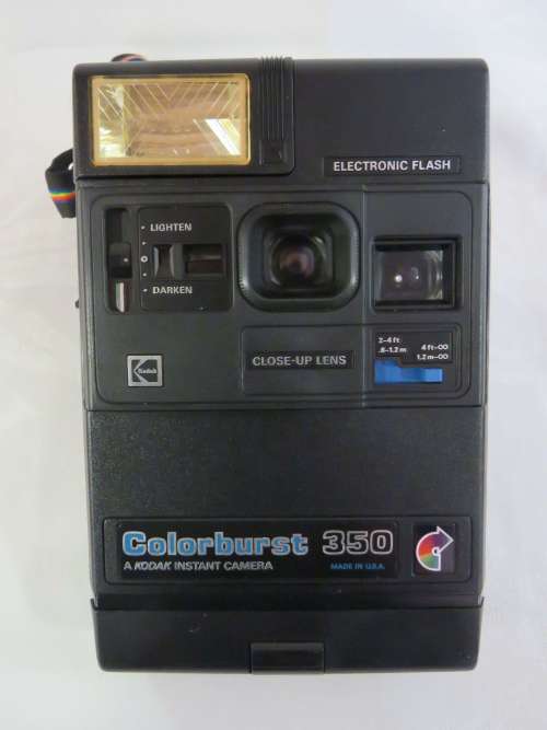 Vintage Kodak Colorburst 350 instant camera with booklet
