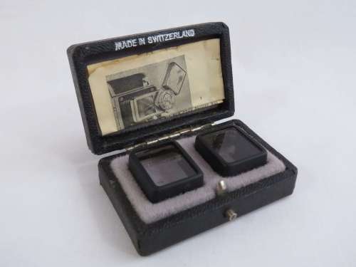 Parallax corrector Prisms for viewfinder of cameras with built-in lightmeter-Original box + leaflet