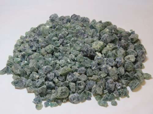 Lot of hundreds of small (1cm) to medium (2.5cm) pieces of rough Florite - Weighs 2.75 Kg