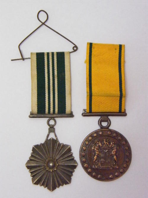 Pair of SA Prison service Medals - Issued to Sergeant W Johnson Faithful Service & Merit Medal - as per photo