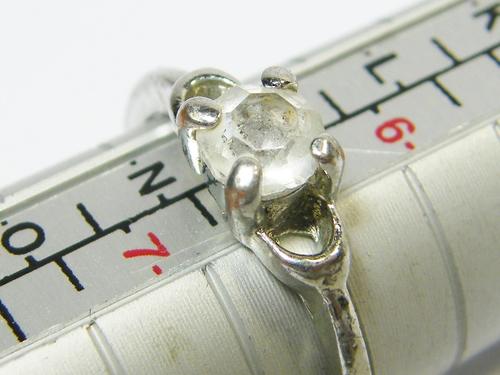 Ladies dress ring with white stones - size M+ - as per photo