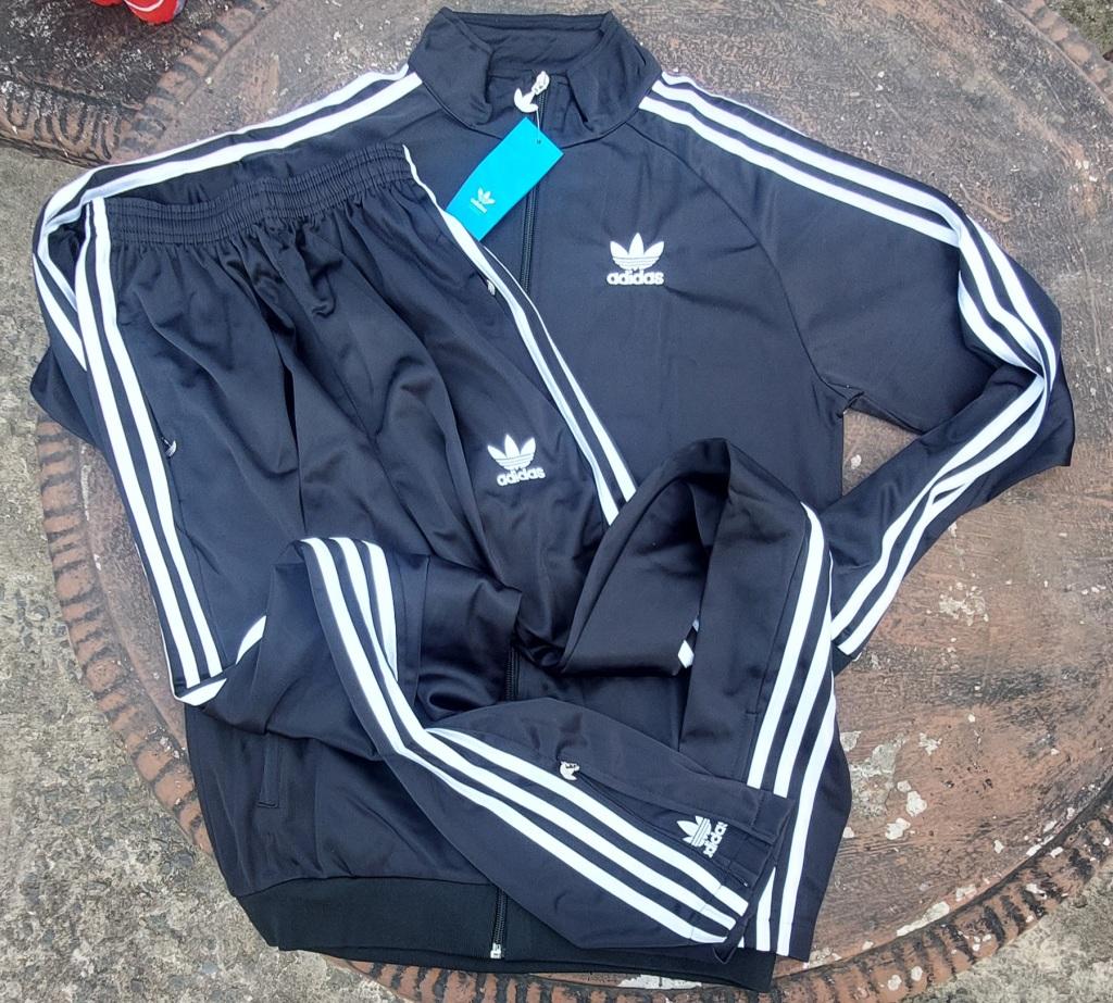 Tracksuits - track suit top and bottom size medium was sold for 441.00 ...