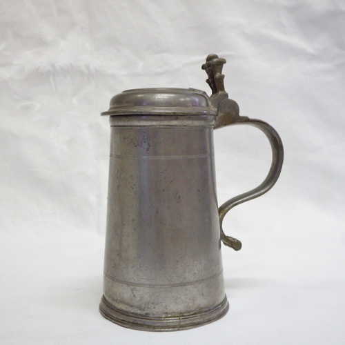 Antique pewter stein marked M.T on lid with plumed thumb piece