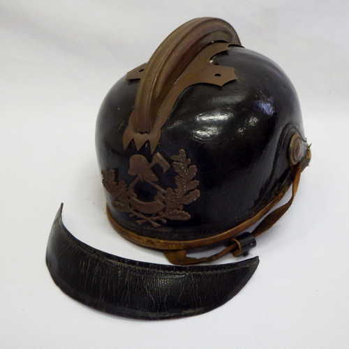 German South West Africa fireman's  helmet - as per photo - front visor loose - RARE