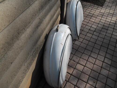 Road - 1930`s car original spare wheel metal covers on the front