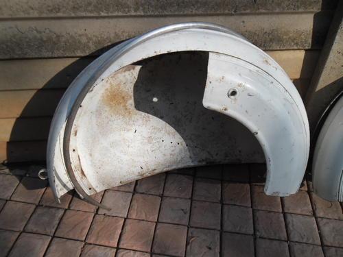 Road - 1930`s car original spare wheel metal covers on the front