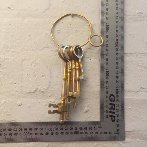 Brass Large Vintage Solid Brass Keyring With Keys!!! was sold for