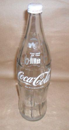 Glass 1 liter coca cola bottle in good condition - postage R40.