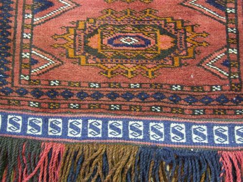 Tribal rug warm earthy colours