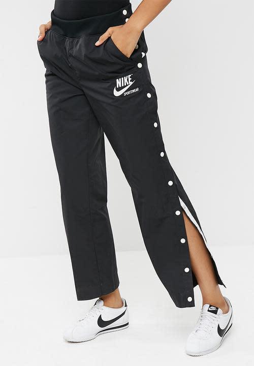 Nike snap hotsell pants womens