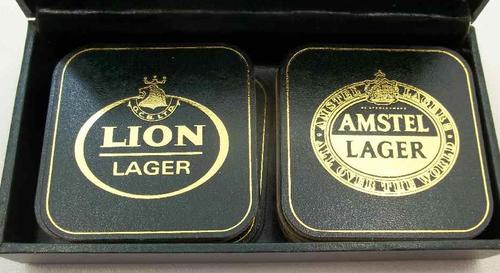 Unused As New Vintage Box Set Of 14 Coasters: Lion Lager & Amstel Lager - Coaster Size: 8cm/8cm