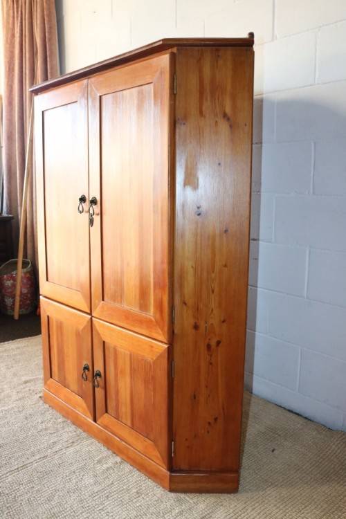 A solid Oregon pine corner display with a large